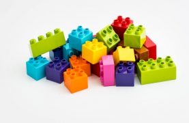 A pile of colored LEGO bricks