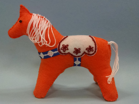 Hand-sewn felt horse ornament.