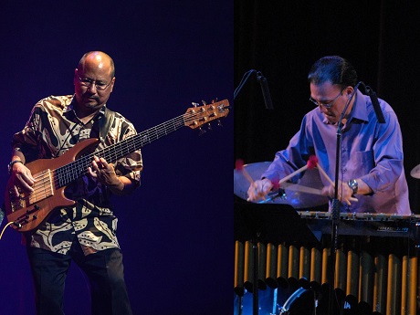 Dean Taba playing electric bass and Noel Okimoto playing vibraphone.