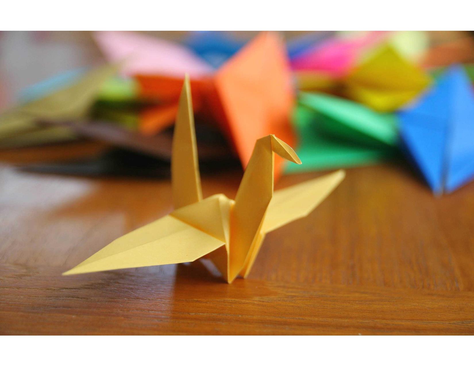 Origami crane folding