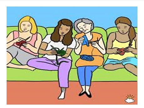 Women on couch knitting