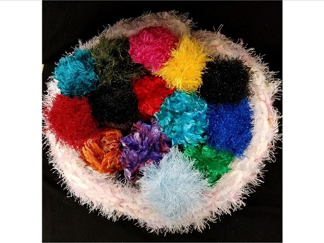 Group of multi-colored yarn with a five-finger lei