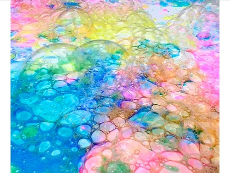 Artwork made with paint leaving a bubble (soapsuds) effect.