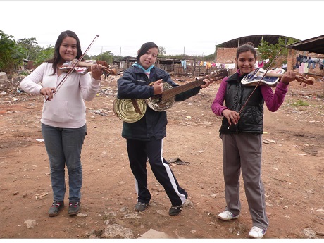 3 teens playing musical instruments