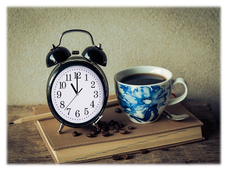 Clock with a cup of coffee