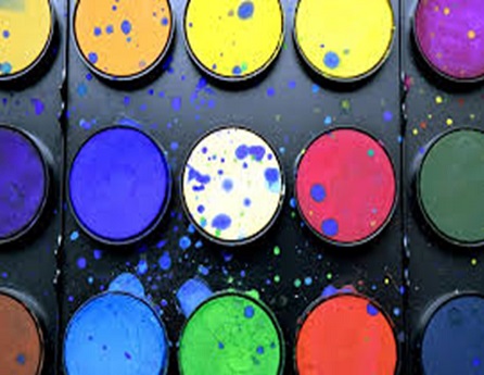 selection of different colors of watercolor paint.