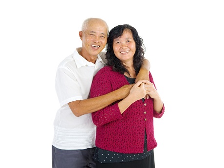 Baby boomer couple hugging each other