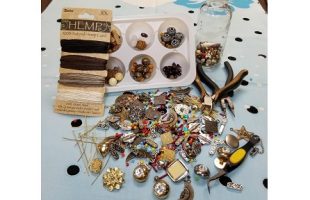 photo of beads and jewelry making tools