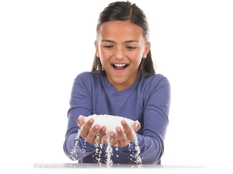 Girl holding instant snow