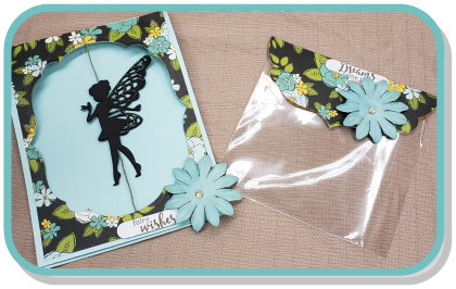 one blue green card with floral border and fairy cut out. one blue green floral favor bag