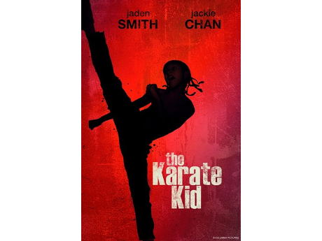 Cover art for the 2010 movie The Karate Kid, featuring a black silhouette on a red background of a young boy performing a high kick.