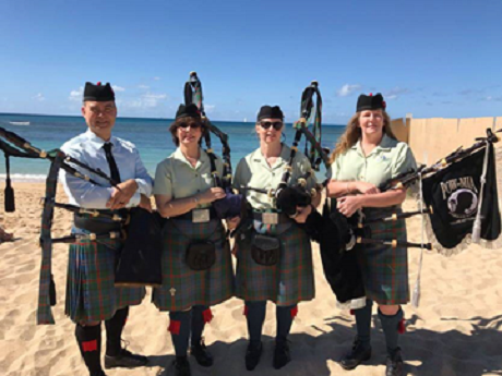 Bagpipers on beach