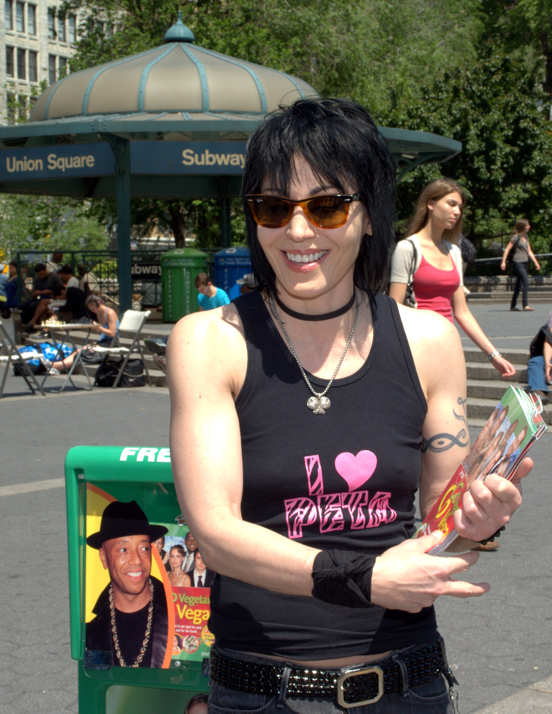Joan jett by Union Square holding brochures