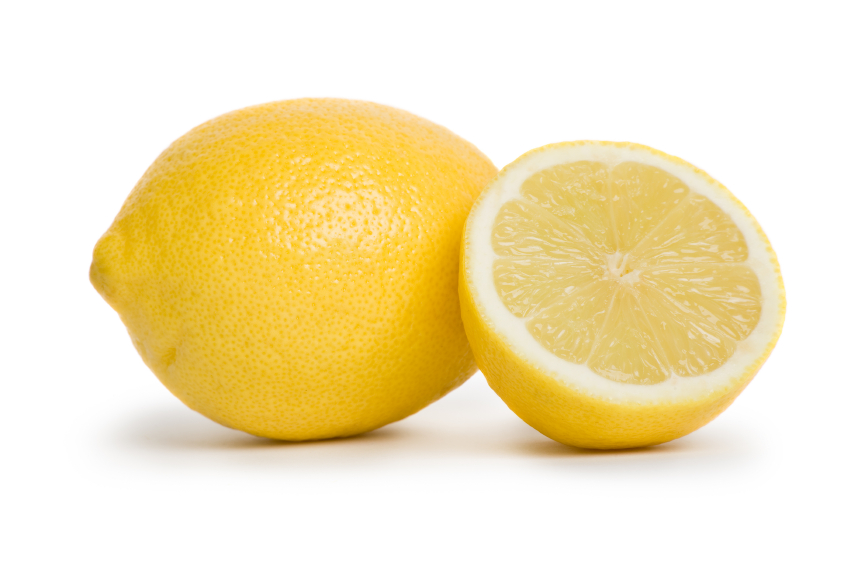 a lemon beside half a lemon