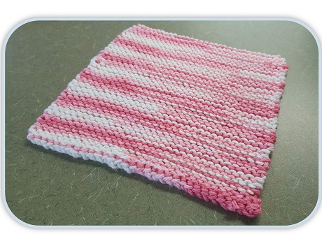 Knitted pink dishcloth
