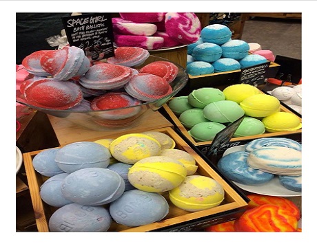 bath bombs on plates with assorted colors