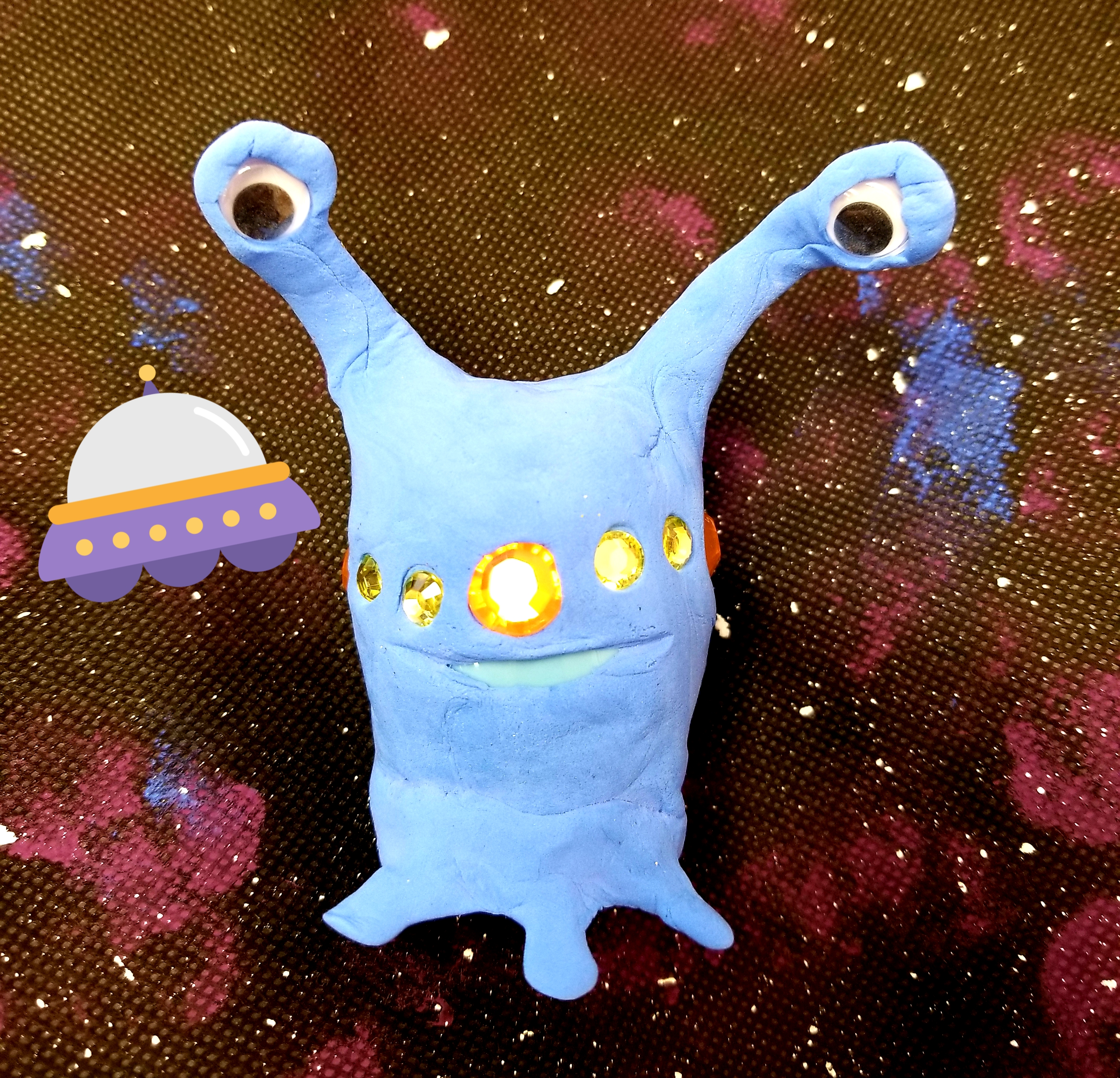 Foam alien with galaxy background