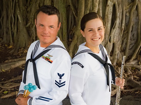 Picture of two people in the fleet holding flute and vibraphone mallets