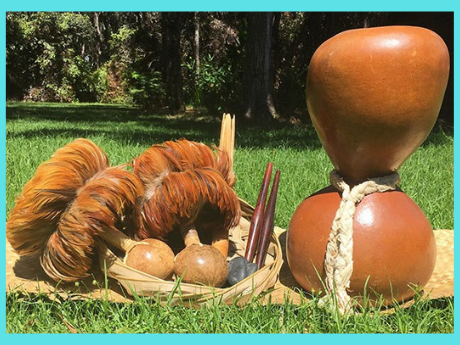 Photography of drums and implements used in hula.