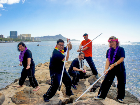 LudoSport International Hawaii Academy lightsaber poses by Magic Island.