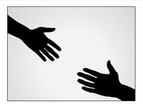 black silhouette of 2 outstretched hands reaching toward each other