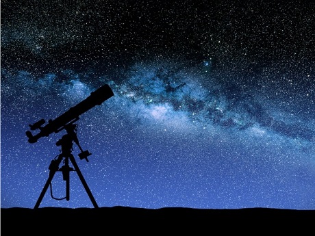 A telescope looking into the night sky