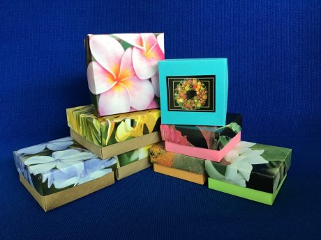 eight masu boxes made of colorful flowered paper