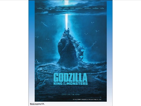Movie Cover: "Godzilla King of Monsters", Giant Godzilla in the middle of the ocean breathing blue fire into the night sky