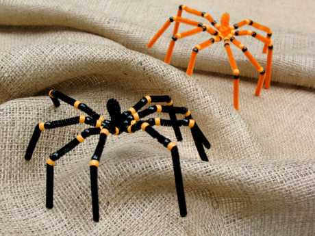 spiders made of pipe cleaners and plastic beads