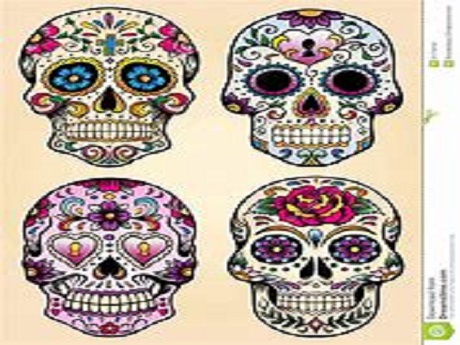 skulls with very colorful designs in honor of Dia de los Muertos.