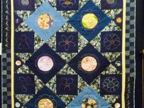 hand stitched quilt by Joan Masaki