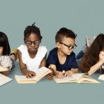 Four children reading books
