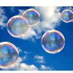 Bubbles against blue sky