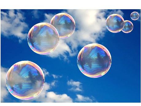 Bubbles against blue sky