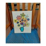 canvas flowers on rocking chair