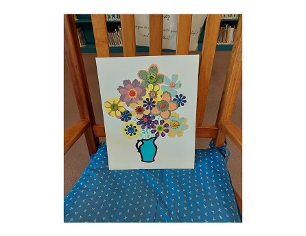 canvas flowers on rocking chair