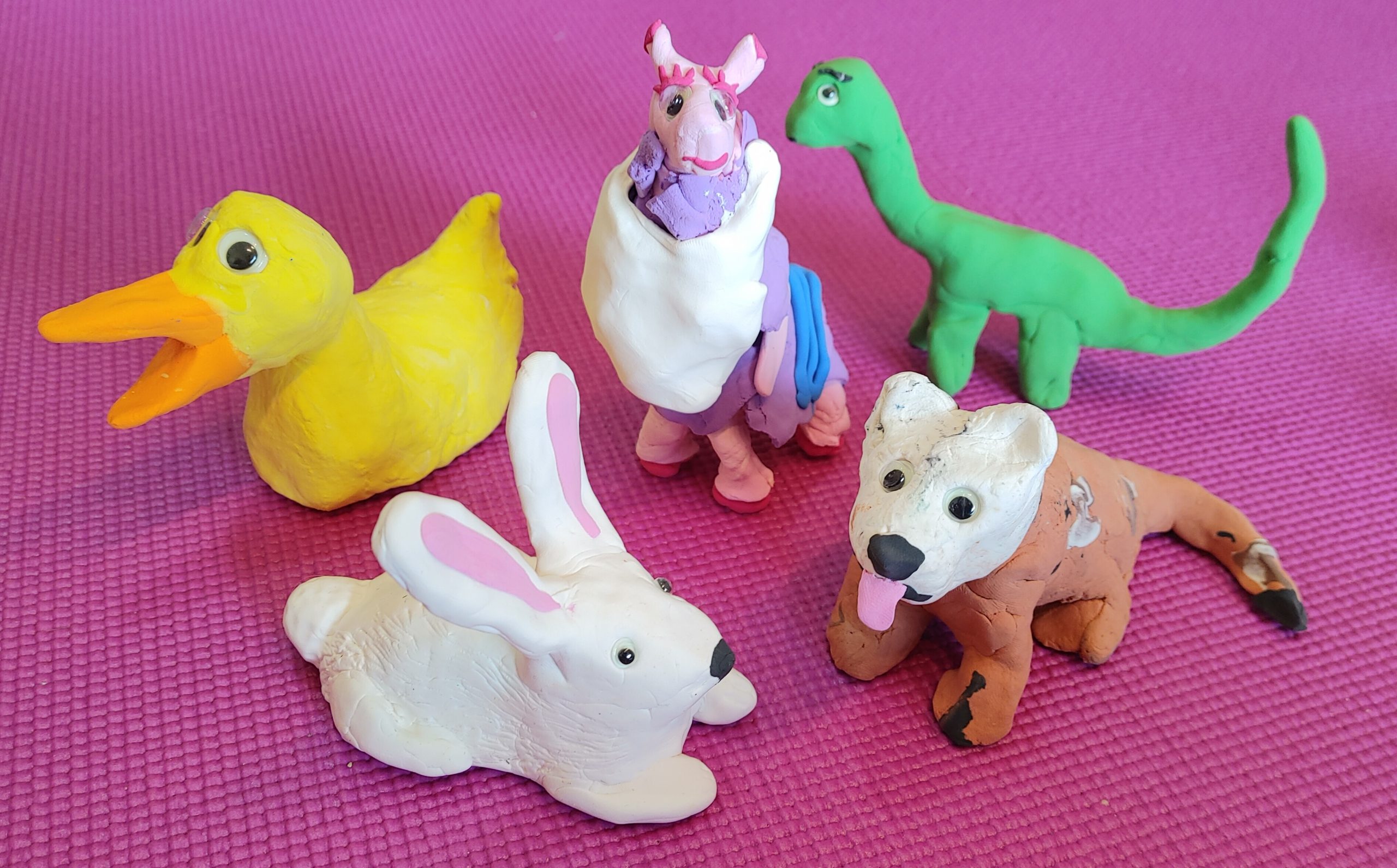 clay duck, llama, dinosaur, bunny, and dog