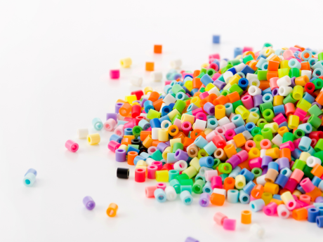 A pile of multi-colored perler beads