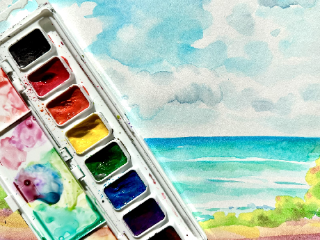Paige Su Ocean Watercolor with a water pallet on top