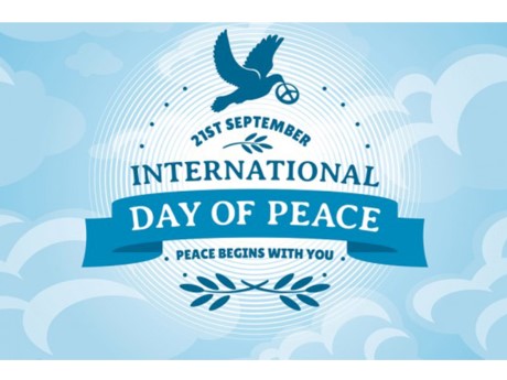 dove with peace sign in beak over 21st September, International Day of Peace, Peace Begins with You