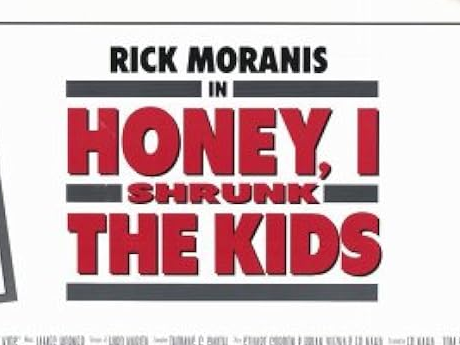 In black letters: "Rick Moranis in: In red letters: "Honey, I Shrunk the Kids"