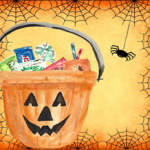 jack o lantern bucket with snacks inside and spider with webs surrounding