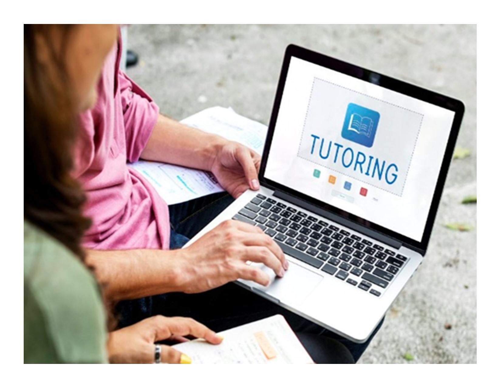 people tutoring on a laptop