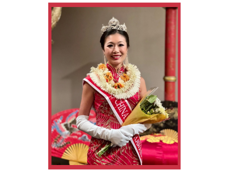 Miss Chinatown Hawaii holding flowers