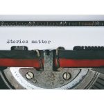 Image of typewriter with words "Stories Matter"