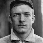Black and white close-up photo of early 20th century baseball player Christy Mathweson in his baseball uniform.
