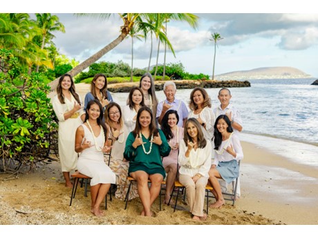 a group of Health Care workers on a beach