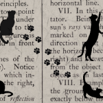 Silhouette cats and paw prints over an old book leaf.