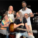 four band members and instruments