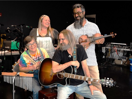 four band members and instruments